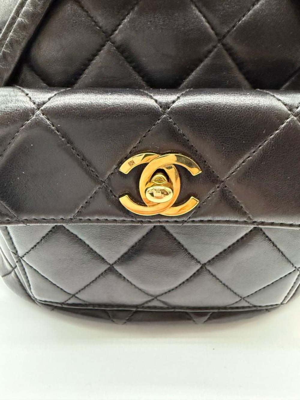 CHANEL Black Quilted Lambskin Backpack with Gold Chain Detail - Picture 4 of 14